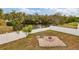 Large backyard with fire pit and water view at 6172 42Nd Street E St, Bradenton, FL 34203