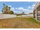 Large backyard with fire pit and privacy fence at 6172 42Nd Street E St, Bradenton, FL 34203