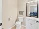 Small bathroom with toilet and vanity at 6172 42Nd Street E St, Bradenton, FL 34203