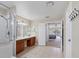 Bathroom with double vanity and shower, bedroom view at 6172 42Nd Street E St, Bradenton, FL 34203