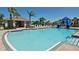 Relaxing community pool with waterslide and plenty of lounge chairs at 6172 42Nd Street E St, Bradenton, FL 34203