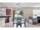 Bright dining area with a round table and four teal chairs at 6172 42Nd Street E St, Bradenton, FL 34203