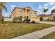 Two-story house with a landscaped yard and two-car garage at 6172 42Nd Street E St, Bradenton, FL 34203