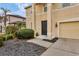 Front entrance of the house with a walkway and landscaping at 6172 42Nd Street E St, Bradenton, FL 34203