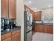 Kitchen with stainless steel appliances and wood cabinets at 6172 42Nd Street E St, Bradenton, FL 34203