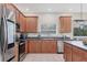 Modern kitchen with stainless steel appliances and an island at 6172 42Nd Street E St, Bradenton, FL 34203