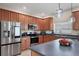 Kitchen with stainless steel appliances and wood cabinets at 6172 42Nd Street E St, Bradenton, FL 34203