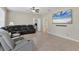 Spacious living room with large TV and comfortable seating at 6172 42Nd Street E St, Bradenton, FL 34203