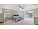 Spacious main bedroom with a large bed and access to a balcony at 6172 42Nd Street E St, Bradenton, FL 34203