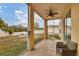 Screened porch overlooking backyard at 6172 42Nd Street E St, Bradenton, FL 34203