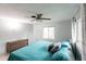 Comfortable bedroom with a king-size bed, dresser, and ceiling fan at 6222 Brentwood Ave, Sarasota, FL 34231