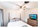 Bedroom with post bed, dresser, and ceiling fan at 6222 Brentwood Ave, Sarasota, FL 34231