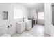 Laundry room with washer, dryer, and a small sink at 6222 Brentwood Ave, Sarasota, FL 34231