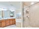 Elegant bathroom with double vanity, soaking tub, and walk-in shower at 6705 Grand Estuary Trl # 201, Bradenton, FL 34212