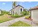 Two-story building with landscaped grounds at 6705 Grand Estuary Trl # 201, Bradenton, FL 34212