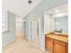 View down hallway showing access to bedrooms and other rooms at 6705 Grand Estuary Trl # 201, Bradenton, FL 34212