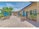 Outdoor patio with tables, umbrellas, and comfortable seating at 6705 Grand Estuary Trl # 201, Bradenton, FL 34212