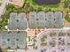 Aerial view showing multiple tennis courts at 6705 Grand Estuary Trl # 201, Bradenton, FL 34212