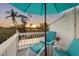 Private balcony with seating and sunset water views at 6821 Longboat S Dr, Longboat Key, FL 34228