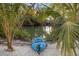 Blue kayak on sandy shore near peaceful waterway at 6821 Longboat S Dr, Longboat Key, FL 34228