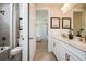 Modern bathroom with double vanity and marble countertops at 719 Maldives Trl, Sarasota, FL 34234