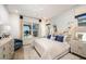 Spacious bedroom with water view, large bed, and coastal decor at 719 Maldives Trl, Sarasota, FL 34234