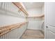 Large walk-in closet with ample shelving and hanging space at 719 Maldives Trl, Sarasota, FL 34234