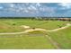 Scenic driving range with practice greens at 7204 Annanhill Ln, Lakewood Ranch, FL 34202