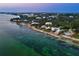 Stunning coastal view featuring multiple waterfront homes at 7314 Point Of Rocks Rd, Sarasota, FL 34242