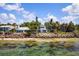 Waterfront homes with tropical landscaping and stunning ocean views at 7314 Point Of Rocks Rd, Sarasota, FL 34242