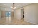 Bright dining area featuring a view into the kitchen and sliding doors to the exterior at 7324 Phillips St, Sarasota, FL 34243