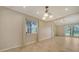 Bright dining area featuring a view into the kitchen and sliding doors to the exterior at 7324 Phillips St, Sarasota, FL 34243