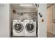 Laundry room featuring a side-by-side washer and dryer at 7324 Phillips St, Sarasota, FL 34243