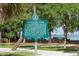 Historic South Lido Park sign nestled among shady trees, with picnic tables and tranquil waterfront views at 7324 Phillips St, Sarasota, FL 34243