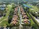 Aerial view of luxury homes in a golf course community at 7503 Calle Facil, Sarasota, FL 34238