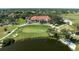 Aerial view of the clubhouse and putting green at 7503 Calle Facil, Sarasota, FL 34238