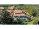 House with pool and screened enclosure, aerial view at 7503 Calle Facil, Sarasota, FL 34238