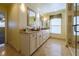 Spa-like bathroom with dual sinks, large shower and marble countertops at 7503 Calle Facil, Sarasota, FL 34238