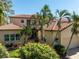 Two-story house with tile roof and landscaping at 7503 Calle Facil, Sarasota, FL 34238