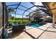 Screened pool and patio overlooking a golf course at 7503 Calle Facil, Sarasota, FL 34238