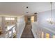 Upstairs hallway with access to bedrooms and bathrooms at 7503 Calle Facil, Sarasota, FL 34238