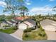 Aerial view of single Gathering home and surrounding houses at 7755 Pine Trace Dr # 7755, Sarasota, FL 34243