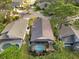 Aerial view showing home, pool, and surrounding neighborhood at 7755 Pine Trace Dr # 7755, Sarasota, FL 34243