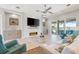 Contemporary living room featuring modern tile flooring, recessed lights, and comfortable seating area at 935 Bayshore Rd, Nokomis, FL 34275