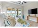 Spacious main bedroom with waterfront views and a comfortable layout for relaxation at 935 Bayshore Rd, Nokomis, FL 34275