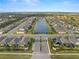 Aerial view of Riverside community with lake and homes at 1012 Fernleaf Run, Bradenton, FL 34212