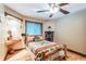 Bedroom with wooden bed frame and Native American decor at 1130 Anclote Rd Rd, Tarpon Springs, FL 34689