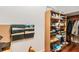 Organized closet with shelving and hanging space for clothes at 1130 Anclote Rd Rd, Tarpon Springs, FL 34689