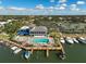 Community clubhouse with pool, marina, and boat slips at 1212 Windward Dr, Osprey, FL 34229