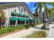 Florida Studio Theatre with green awnings and landscaping at 1233 N Gulfstream Ave # 502, Sarasota, FL 34236